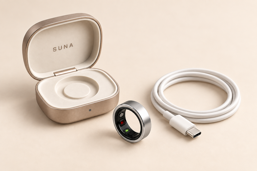 Suna bundle with one silver ring, an open cream charging case, and a white USB-C cable